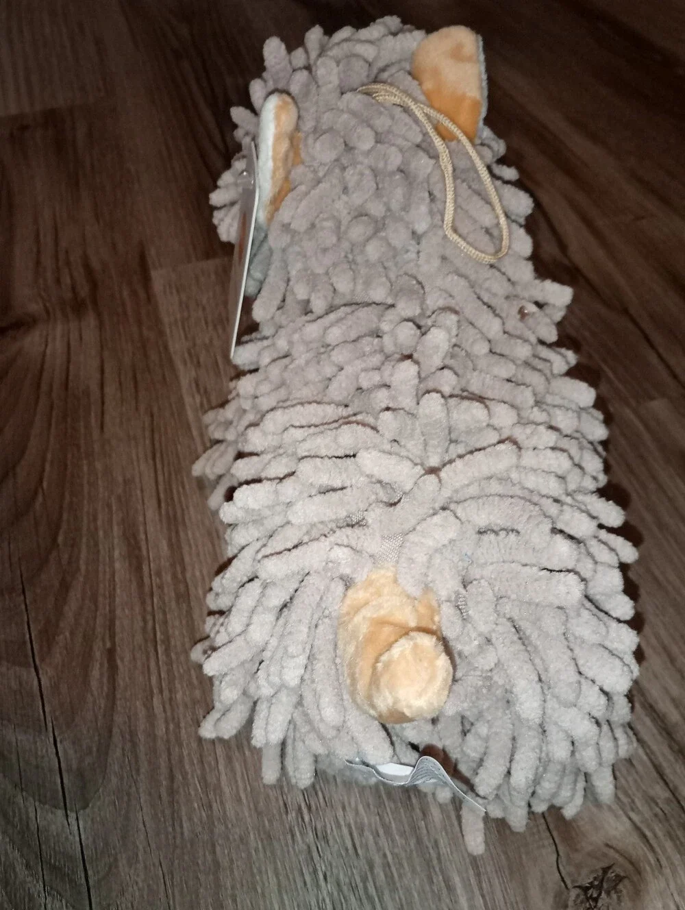 Hand towel:  Plush Mop Dog Hand Towel Light Gray and beige.